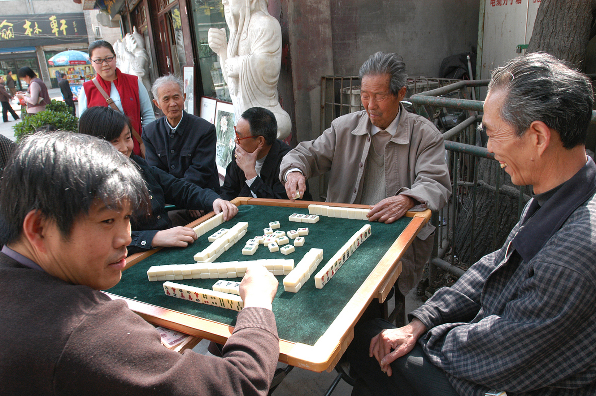 打麻将多偷两张牌图片