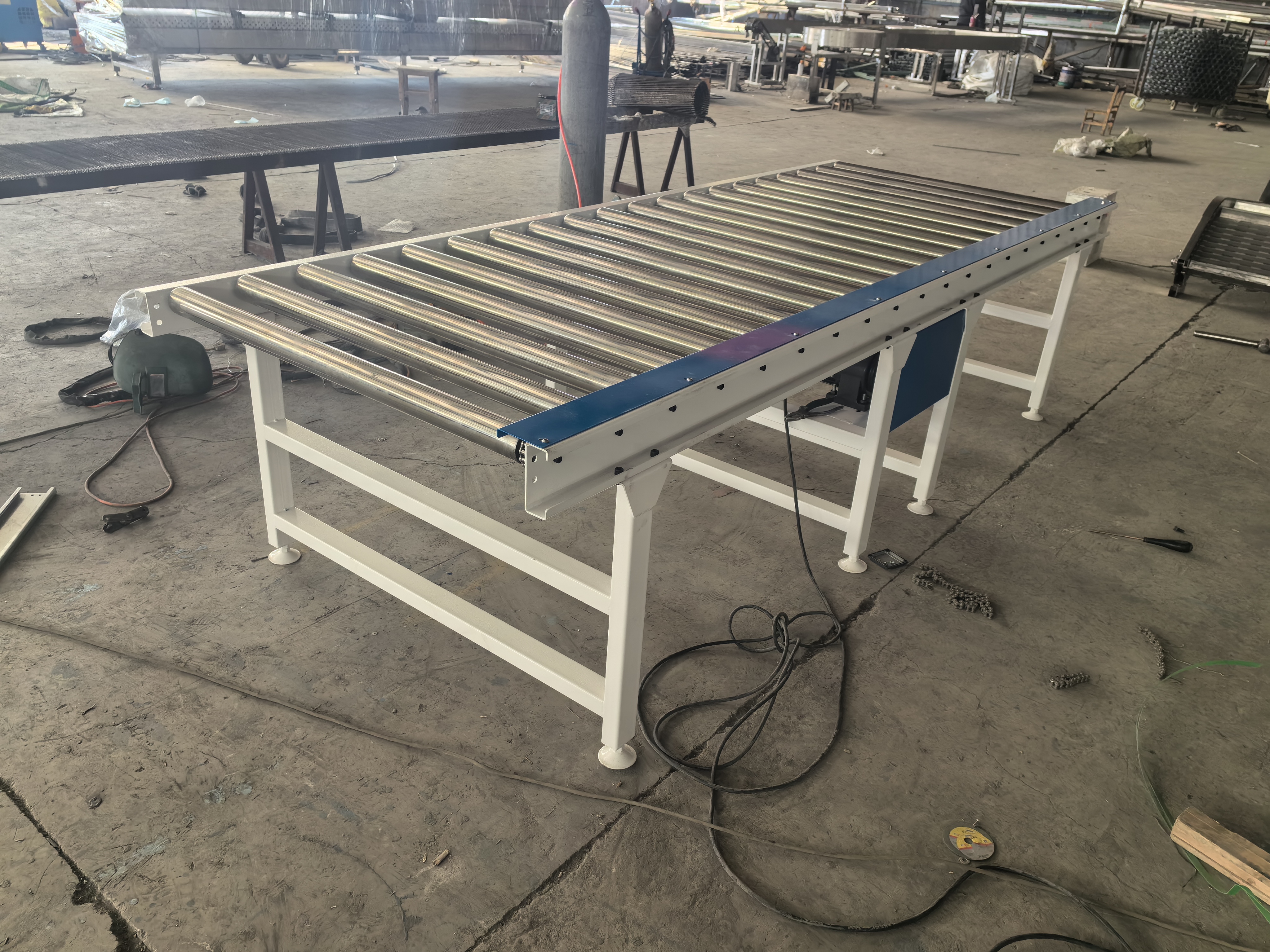 如何选购合格质量好的滚筒输送机传送带自动化滚轴辊道输送线