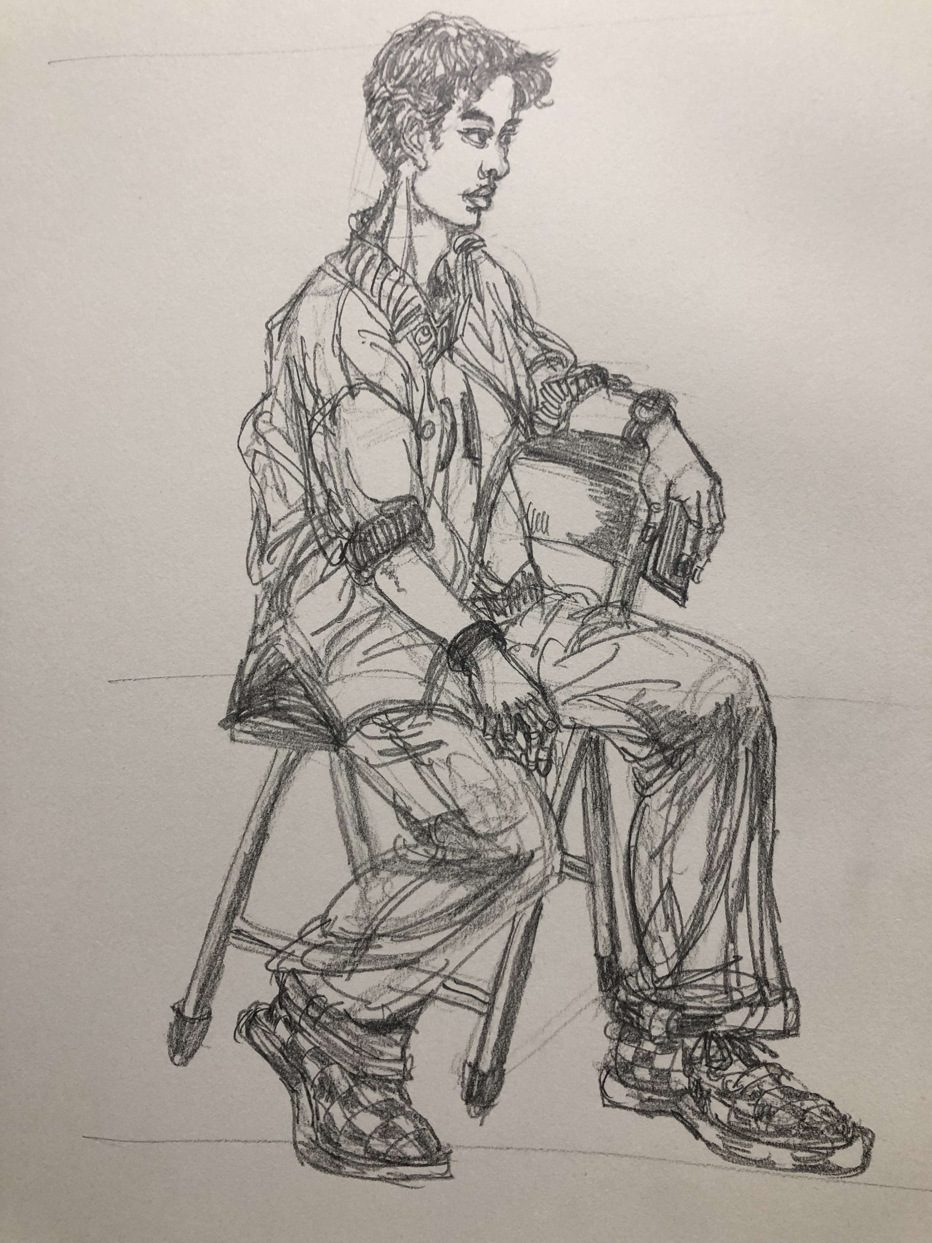 线性速写, 青年男子坐姿,侧颜,一手持手机.#艺术燃冬计划