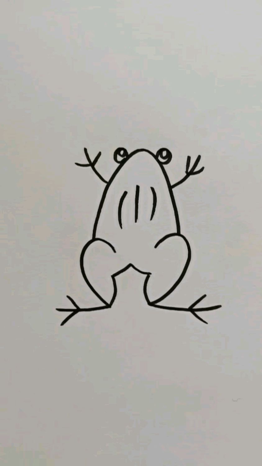 先写两个正反3画青蛙