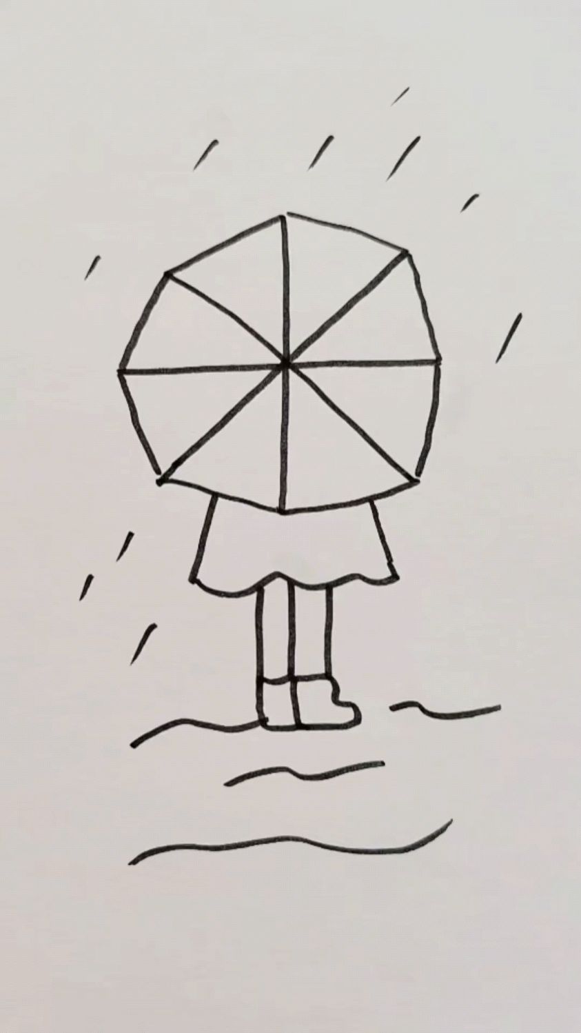 用米字画撑伞小女孩