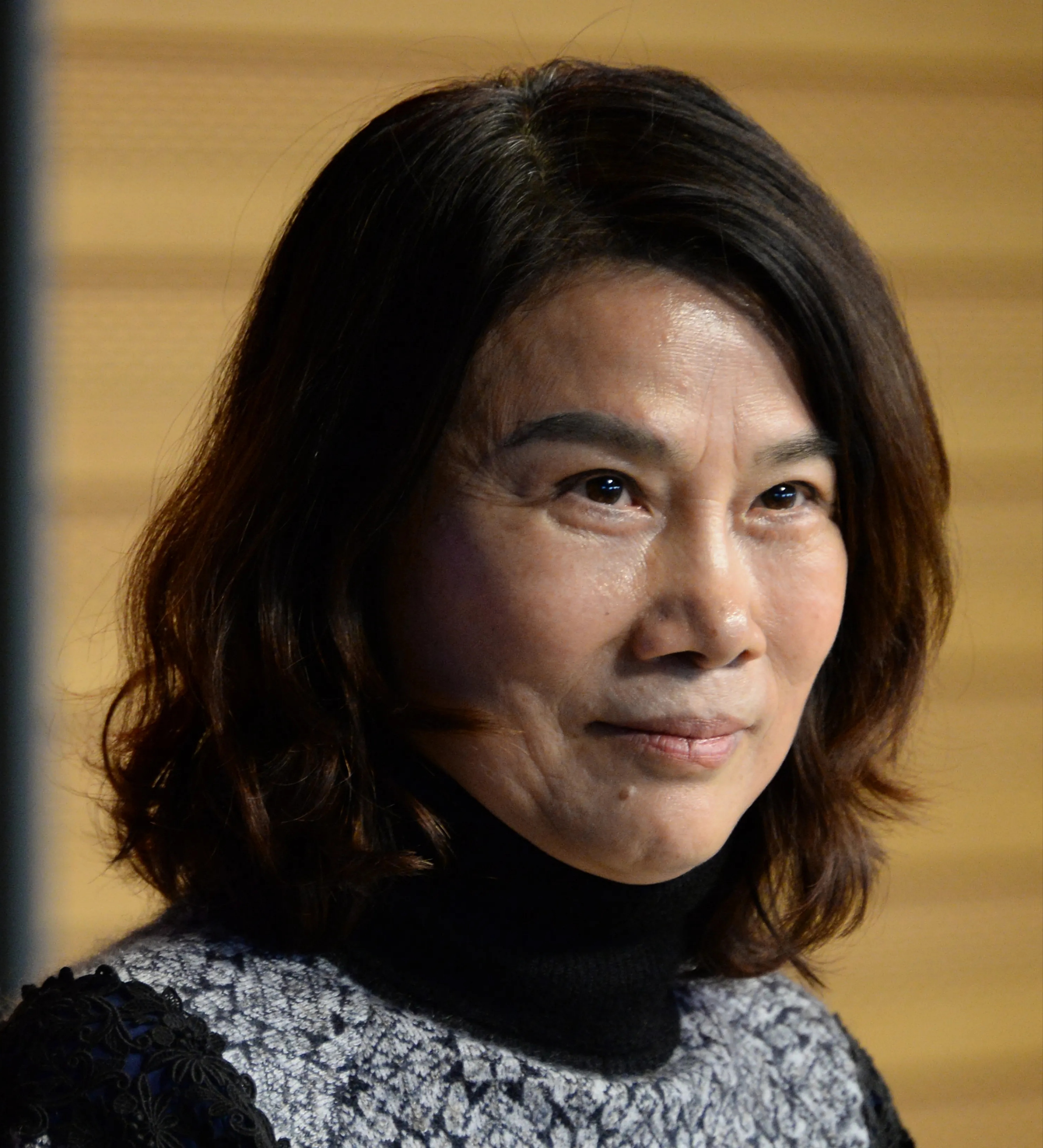 素颜的董明珠,长相像梳着长发的男人