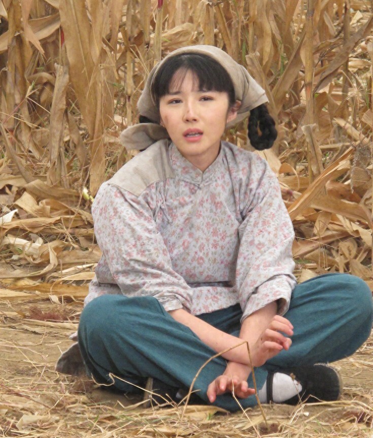 其实她就是个大字不识一个的农村妇女