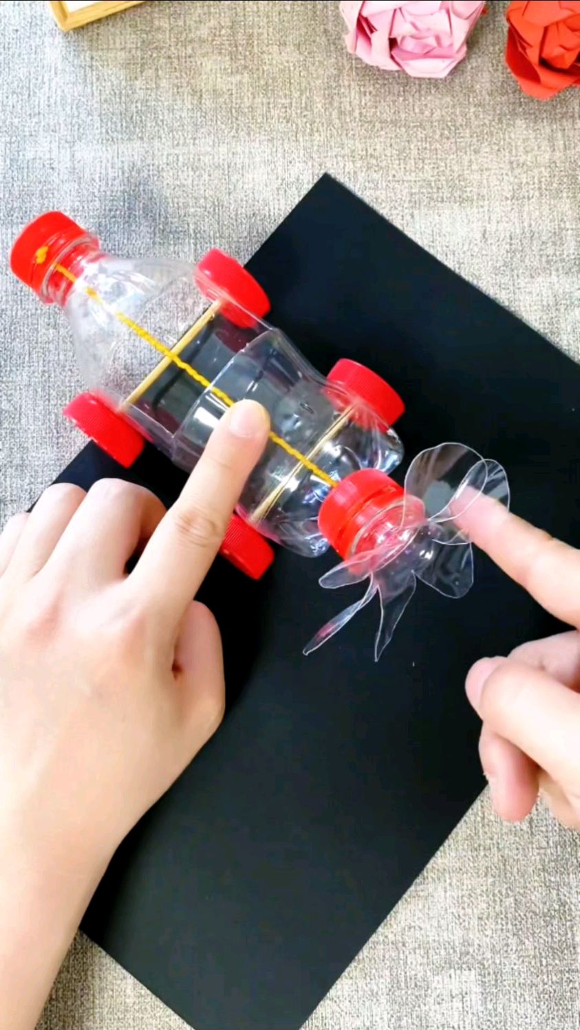 用矿泉水瓶子做个好玩的小风车
