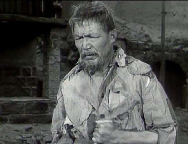 他是《红岩》中的疯老头原型,曾被关押14年,越狱后结局令人伤感