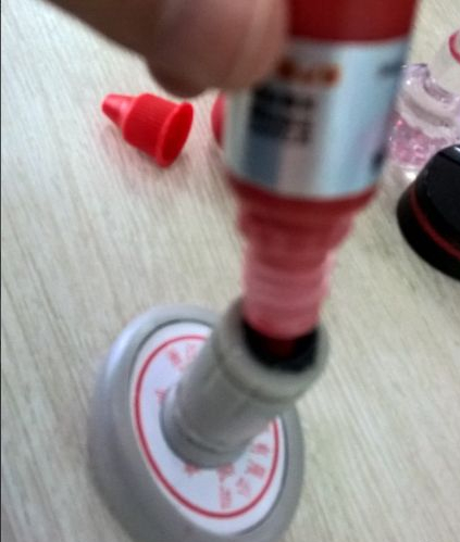 伸缩印章怎么加印油