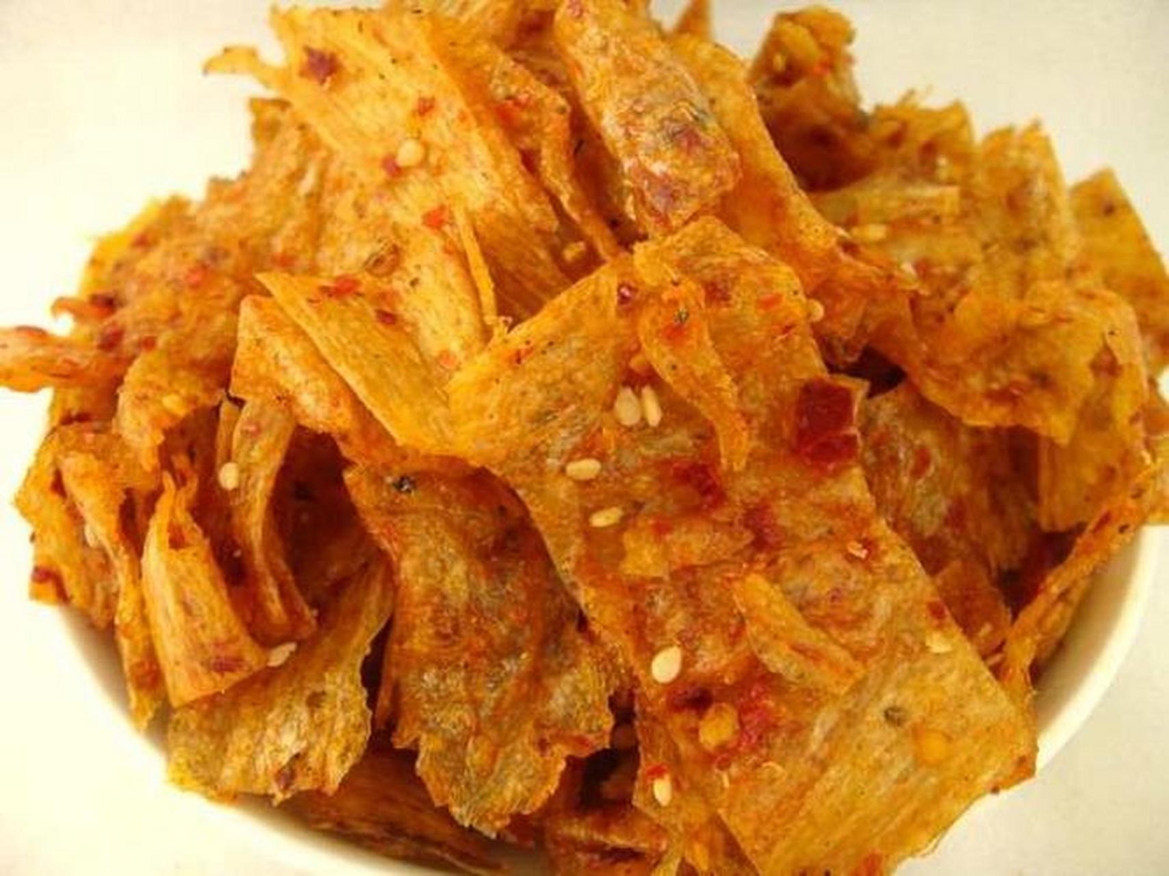 花蝴蝶是江西萍乡的特色美食,是老式豆皮,干干的,辣中带甘,回味饱满.