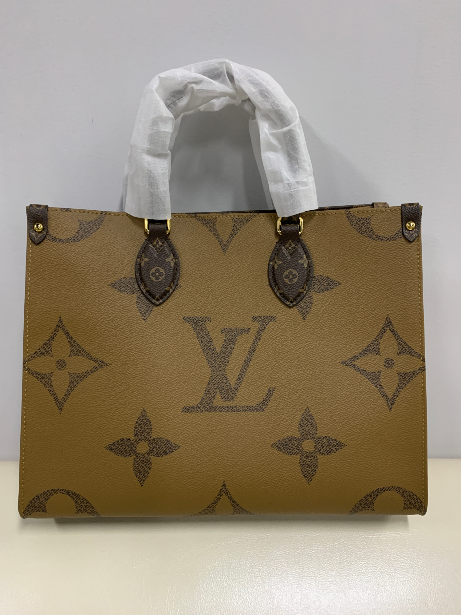 lv包手柄套白色塑料膜的真相