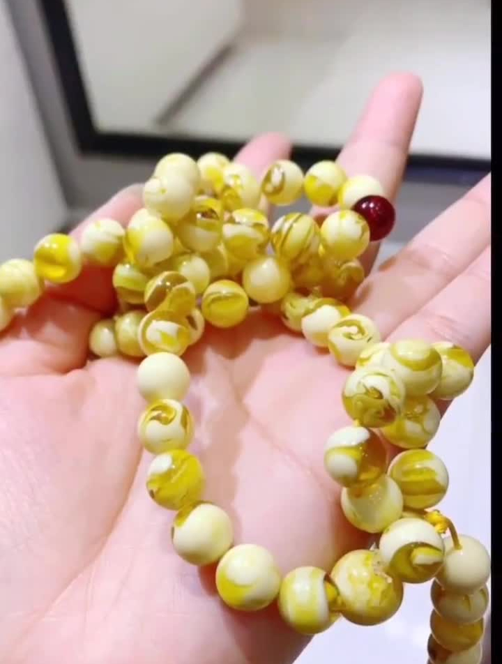 塑料仿蜜蜡,这塑料长的特别像花蜜-度小视