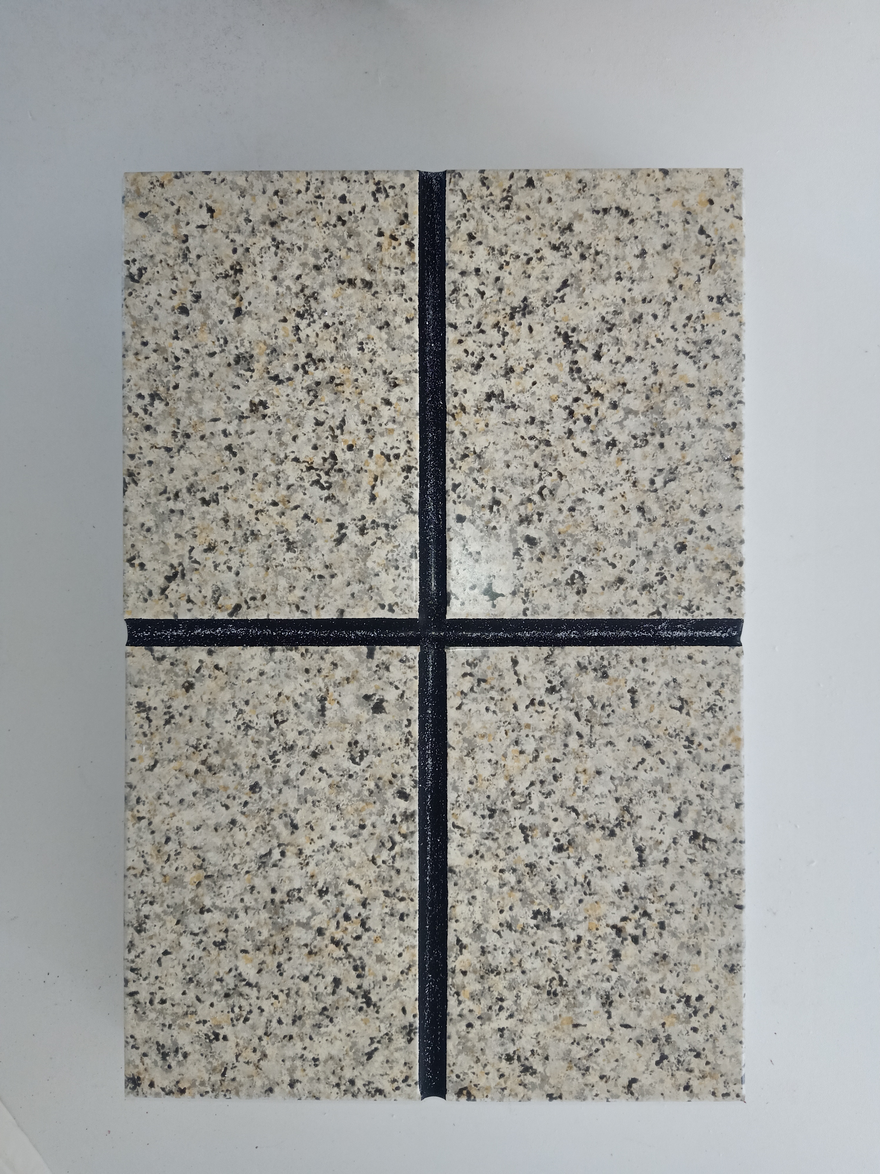 仿石材的金属外墙保温一体板