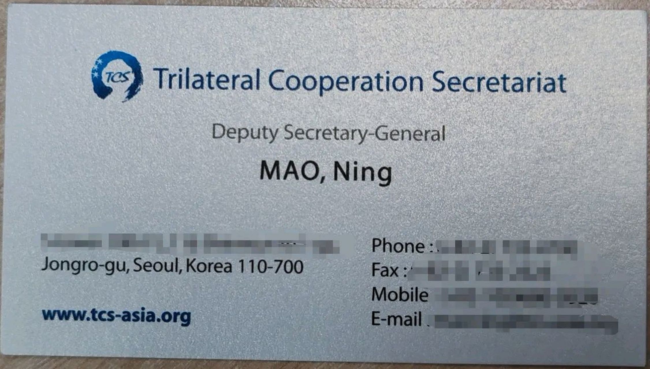 翻旧的名片夹,无意中翻到了现任外交部发言人毛宁