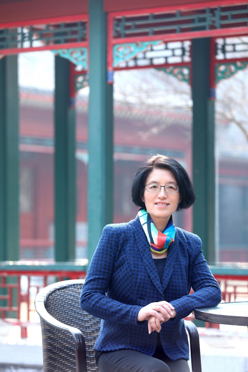 北大教授李玲说:"一群正在享受着免费医疗的人,却竭力反对推行全民