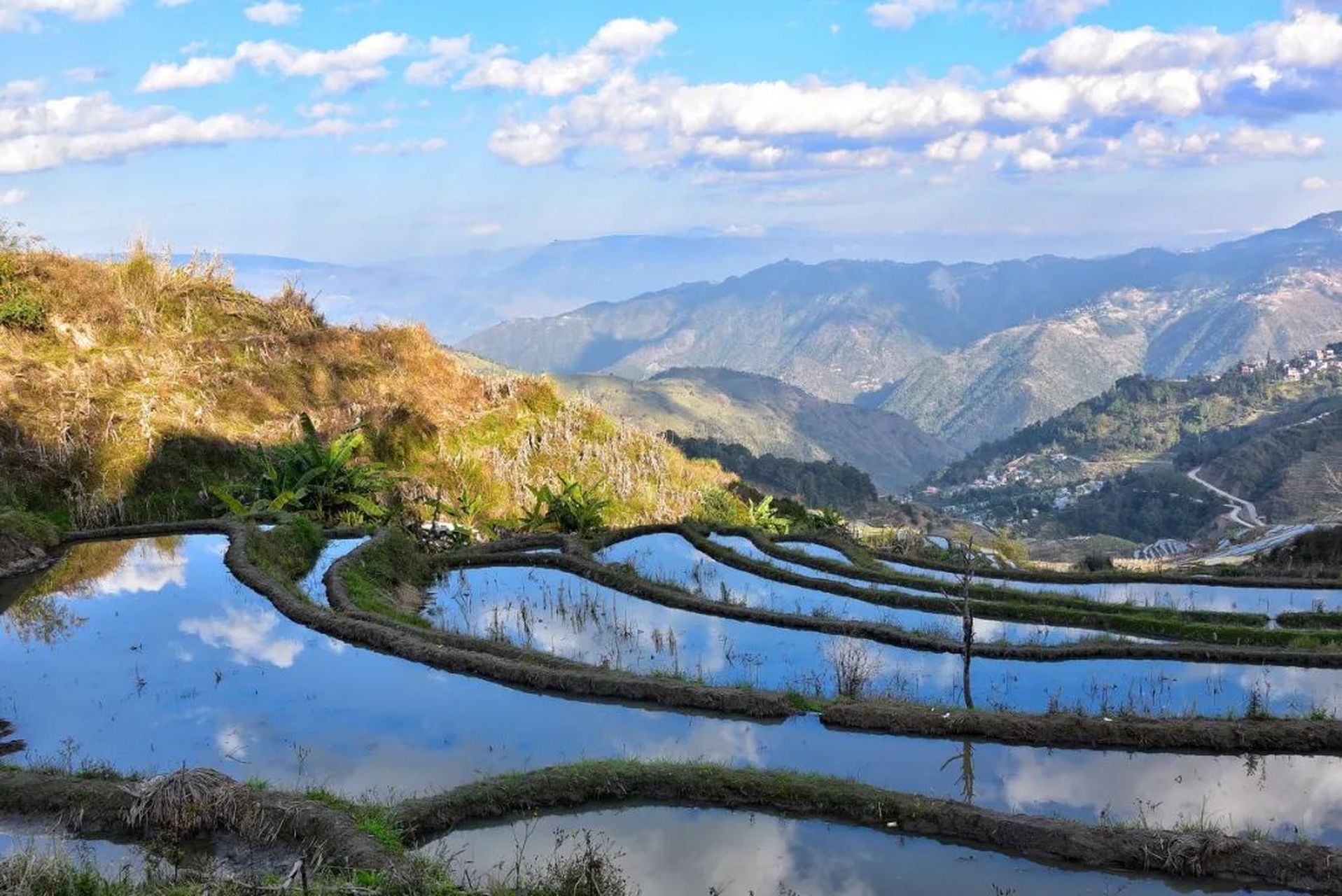 云南那诺梯田是哈尼梯田旅游区中最美的之一,元江哈尼云海梯田旅游区