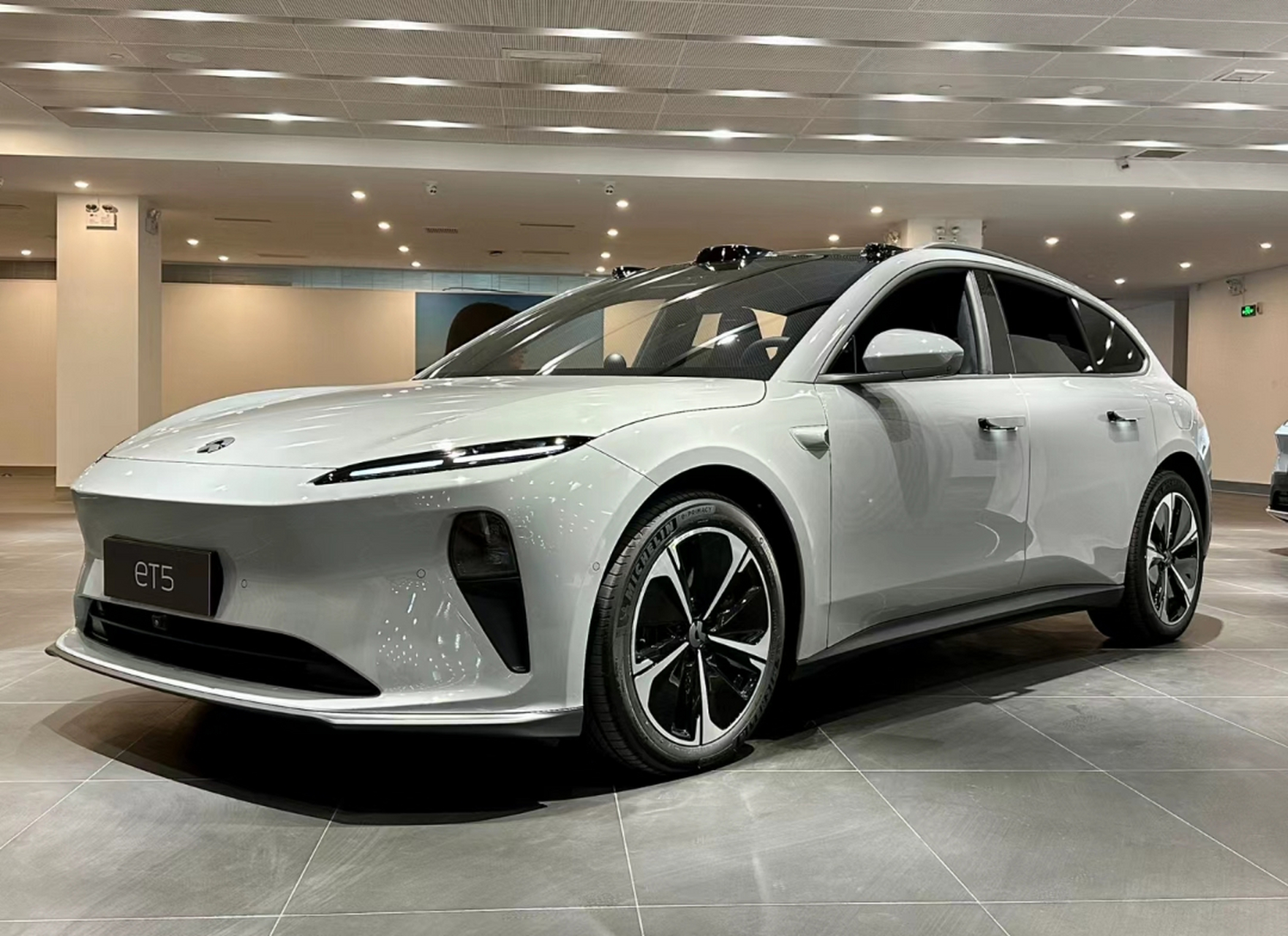 蔚来et5猎装版的尾部设计确实在线,只是这两位车主的留言有点意思,发