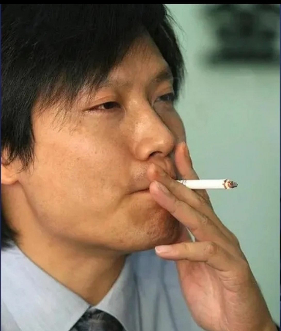 雷军早年抽烟照片
