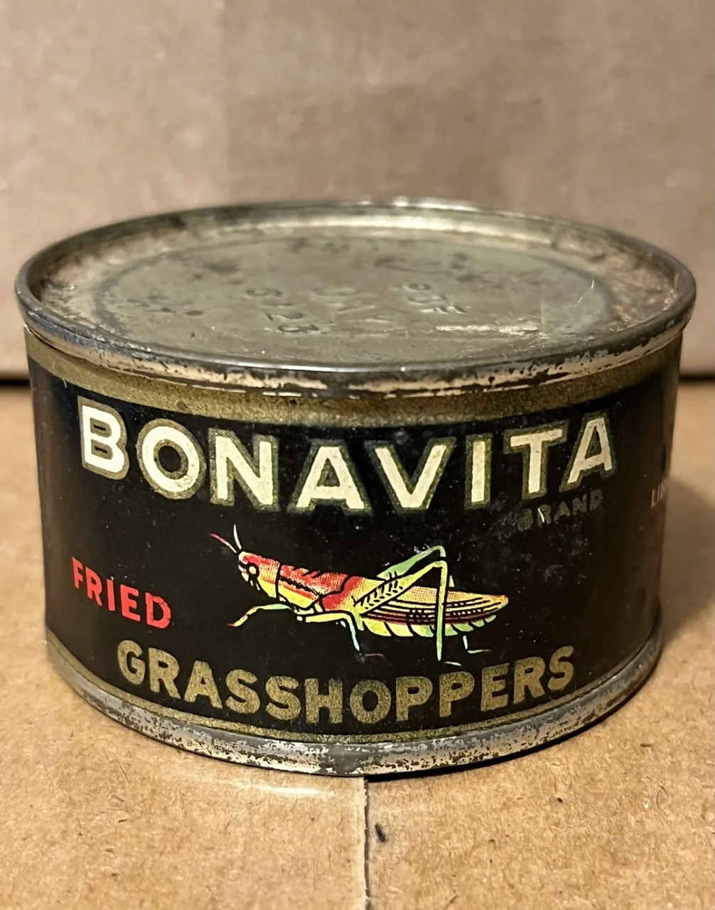 100年前的日本油炸蚂蚱罐头.