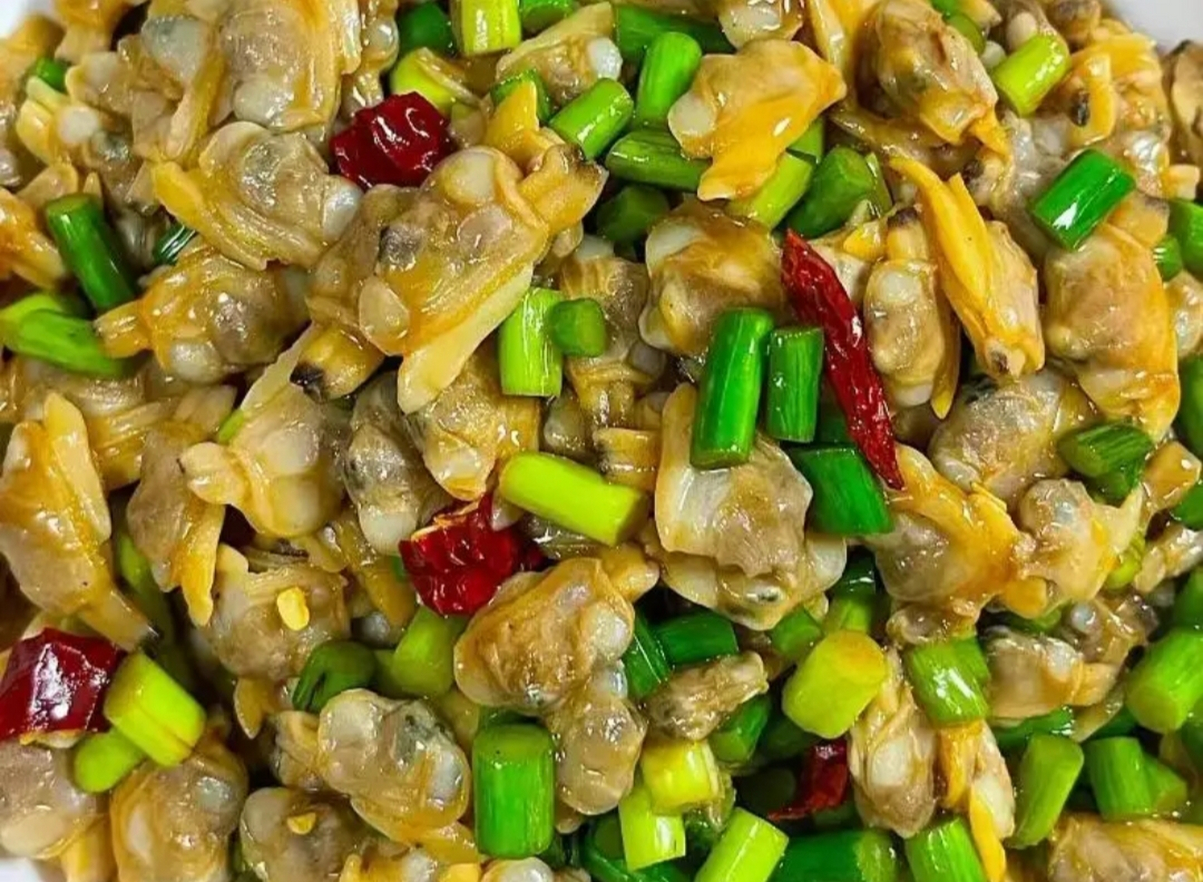 我的美食分享#  蒜苔炒花甲肉  准备食材:花甲,蒜苔,干辣椒.