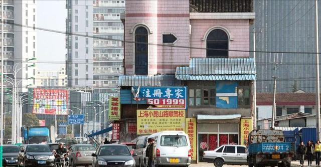 上海最牛钉子户,霸占主干道14年,向政府要价1个亿外加6套房