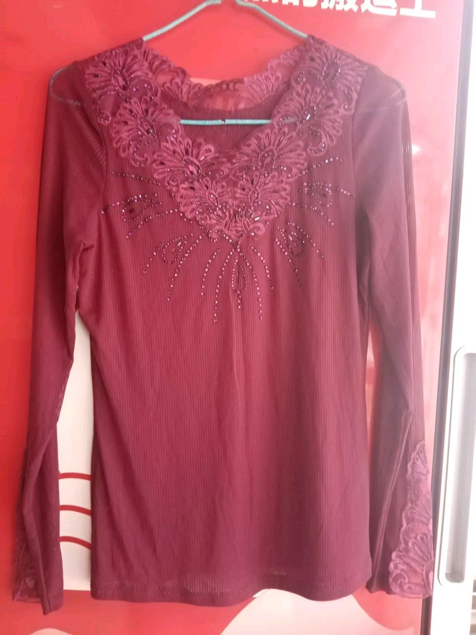 顾客拿来的这件衣服,她说袖子长了.