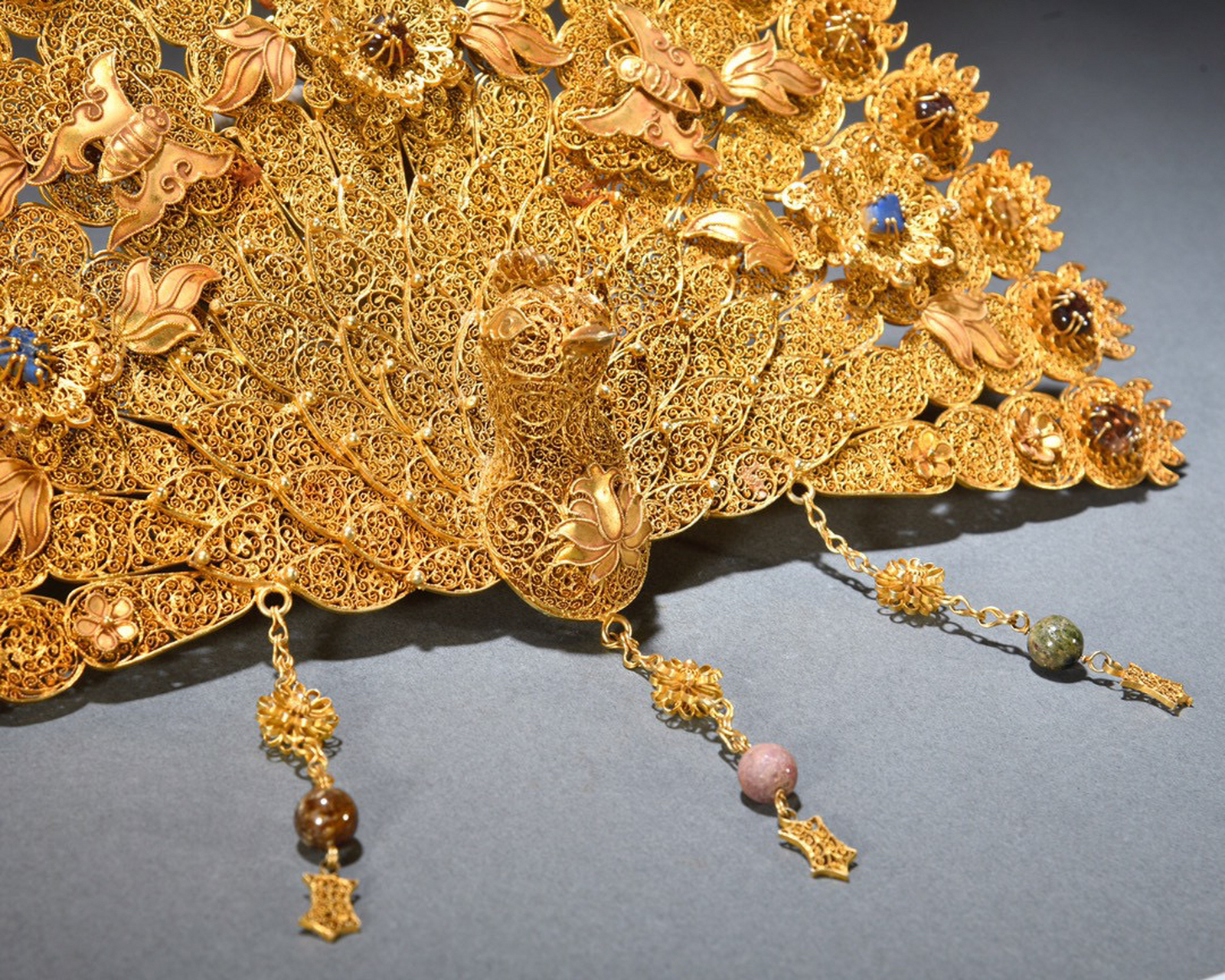 回流·纯银鎏金孔雀扇 规格:长32cm  宽29.5cm 重430g