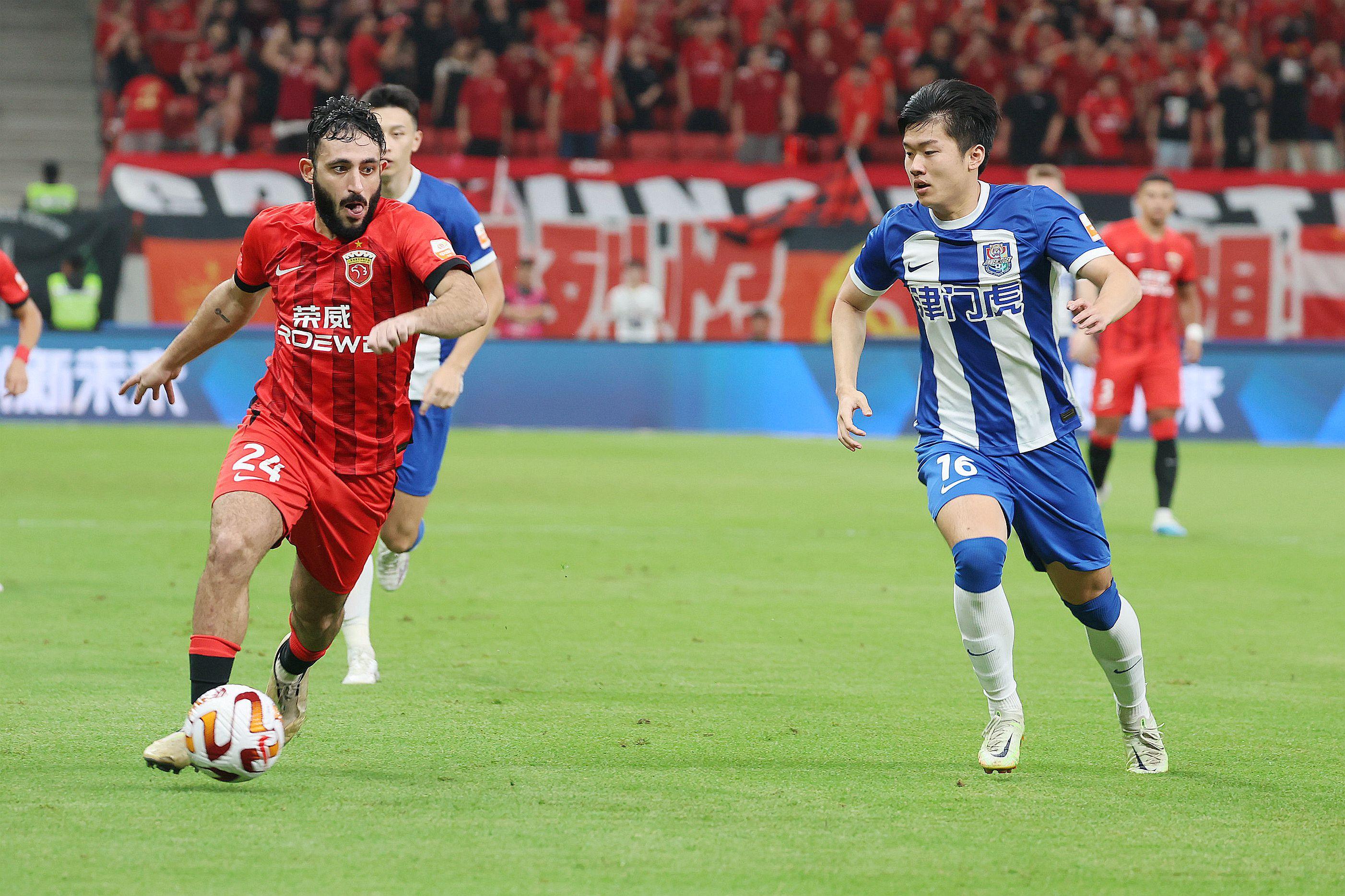 引言2023年中超联赛第20轮,上海海港在主场迎战天津津门虎.