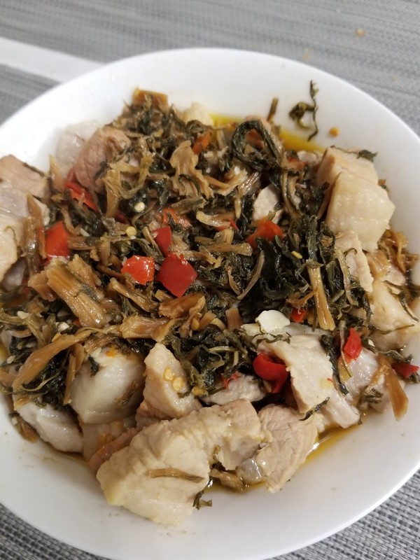 家常美味:酸菜蒸肉的烹饪秘诀