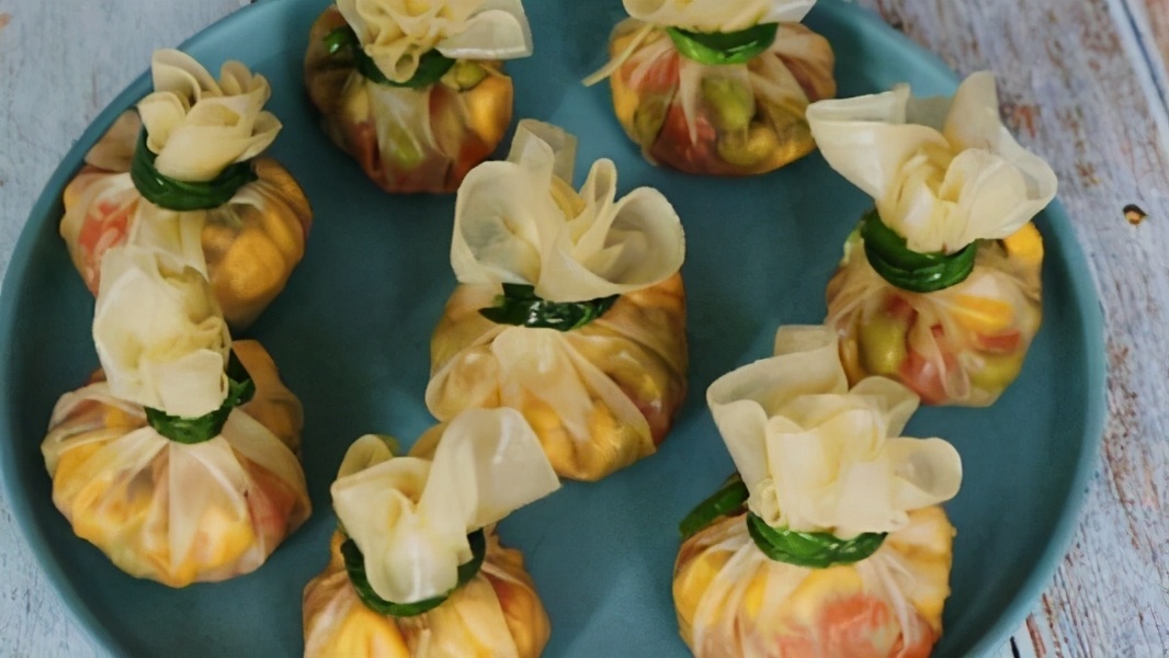 给年夜饭加道菜,"四喜福袋"端上桌,寓意福气满满,无忧无虑