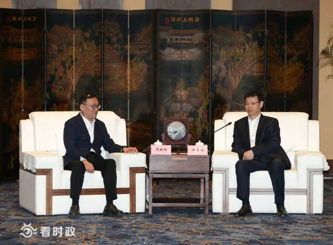 有限公司董事长沈晓初,总裁周军一行