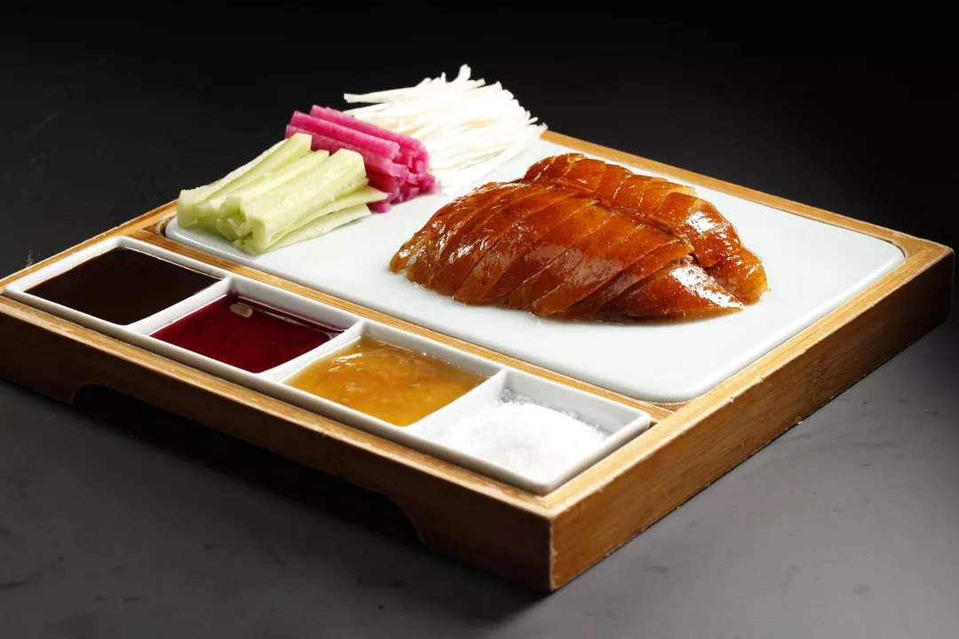 为什么电影《天下无贼》最后时刘若英要吃烤鸭?