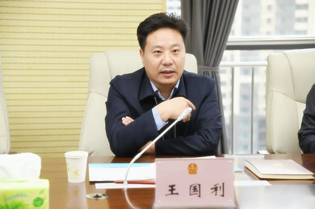 修武县法院院长王国利一行到林州法院参观交流