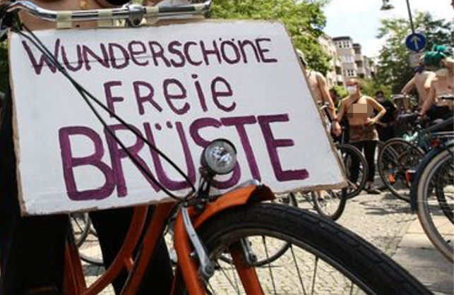 德国数百名女子光着上身骑单车街头抗议,要求自己的身体自己选择