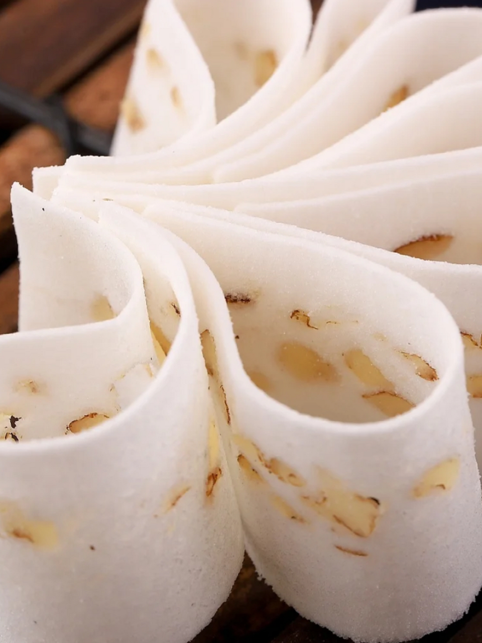 品味合川桃片:细腻与香醇的完美结合  我曾有幸品尝过合川桃片.那是一