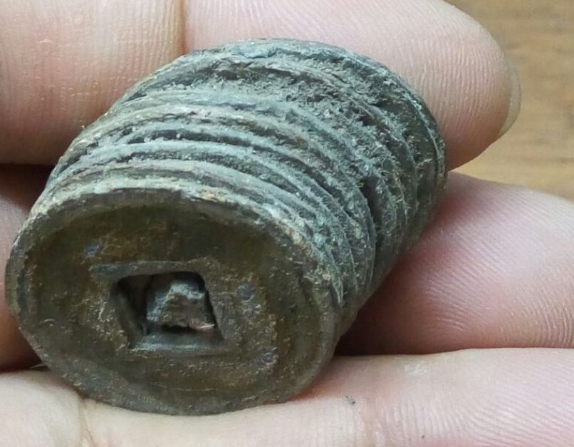 阮朝时期,"半银半钱"的港税是如何进行推行的?