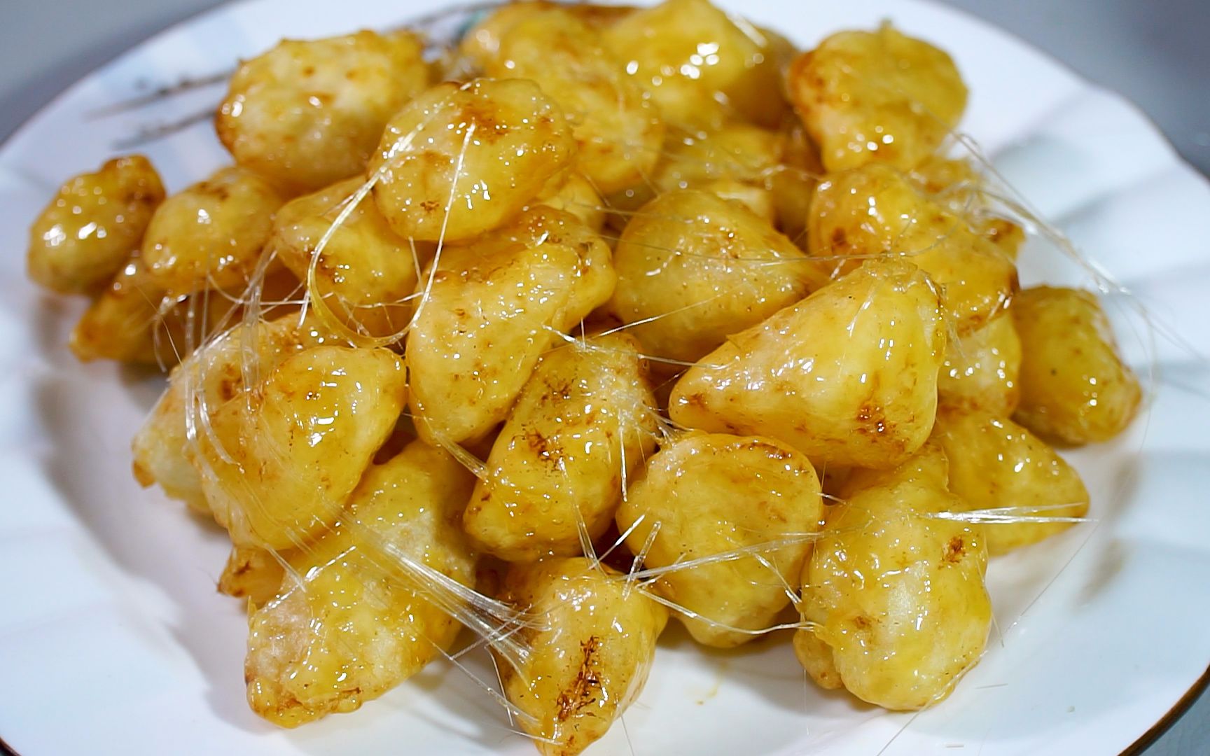 鲁菜拔丝山药:一道赋予记忆甜蜜的中国传统美食