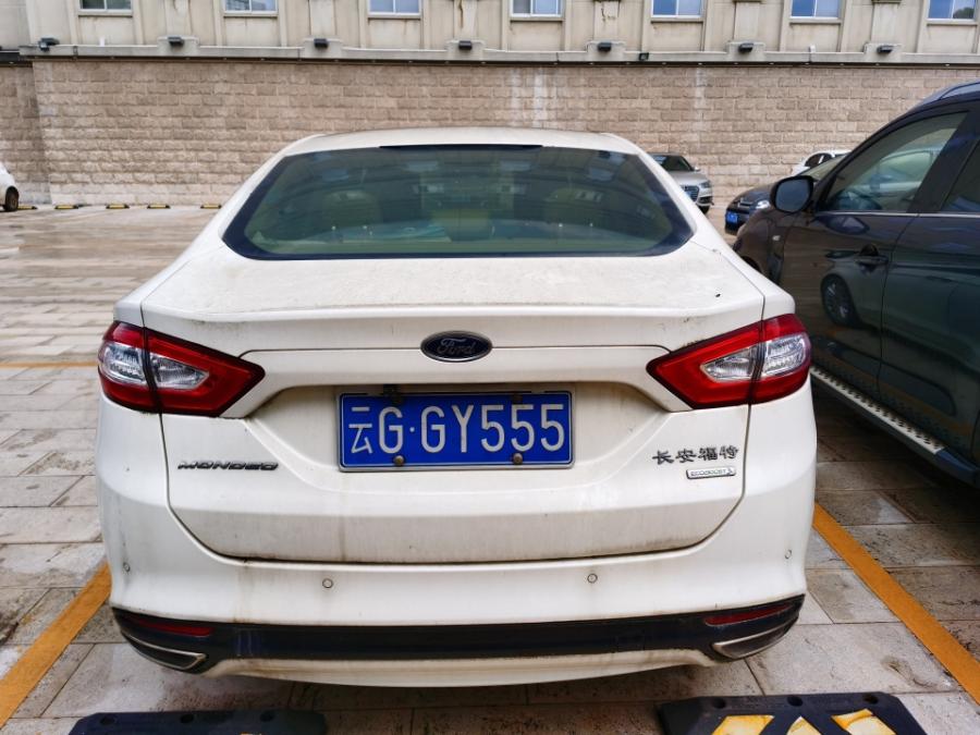 拍卖成功!云南省蒙自市一辆车牌号为,云ggy555长安福特牌蒙迪欧