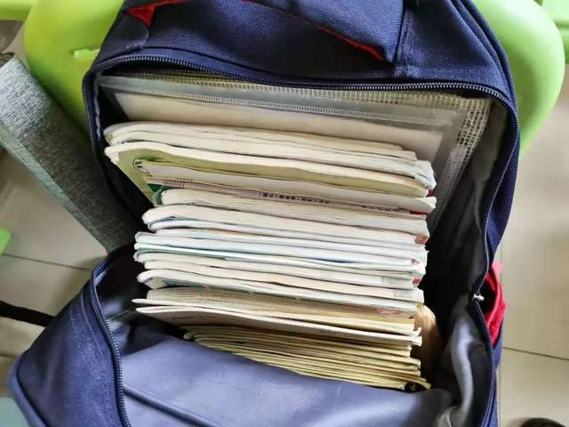郑东新区中州大道小学:巧手"慧"整理,书包大比拼