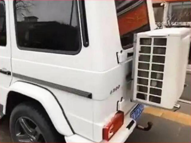 奔驰大g个性改装,车尾不带备胎挂空调外机,网友:新型广告?