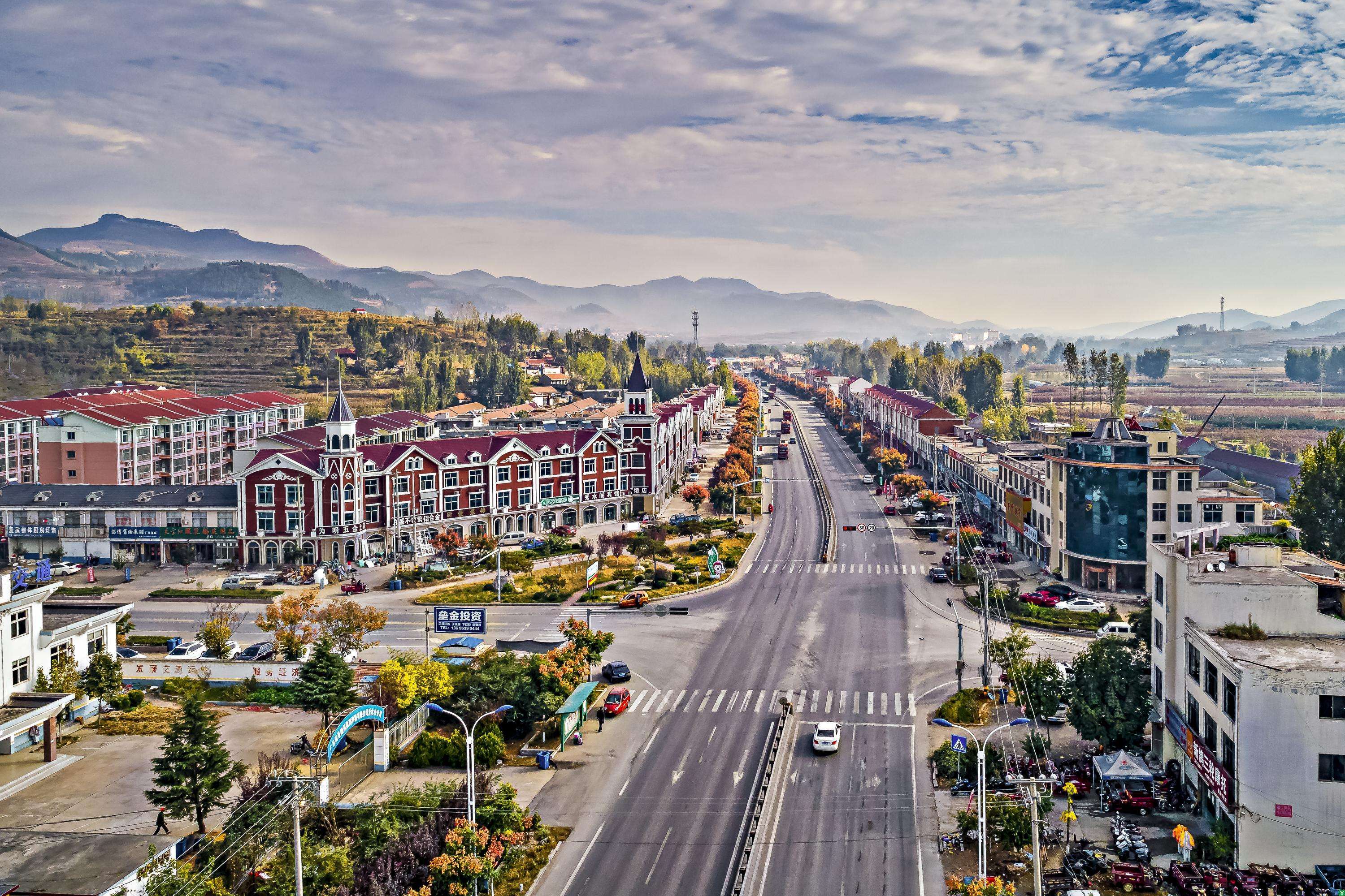 中国城镇化率提高,城乡收入差距问题如何解决?