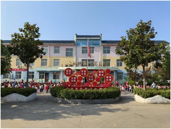 河南金牛实业集团王建强:情系家乡助推教育发展