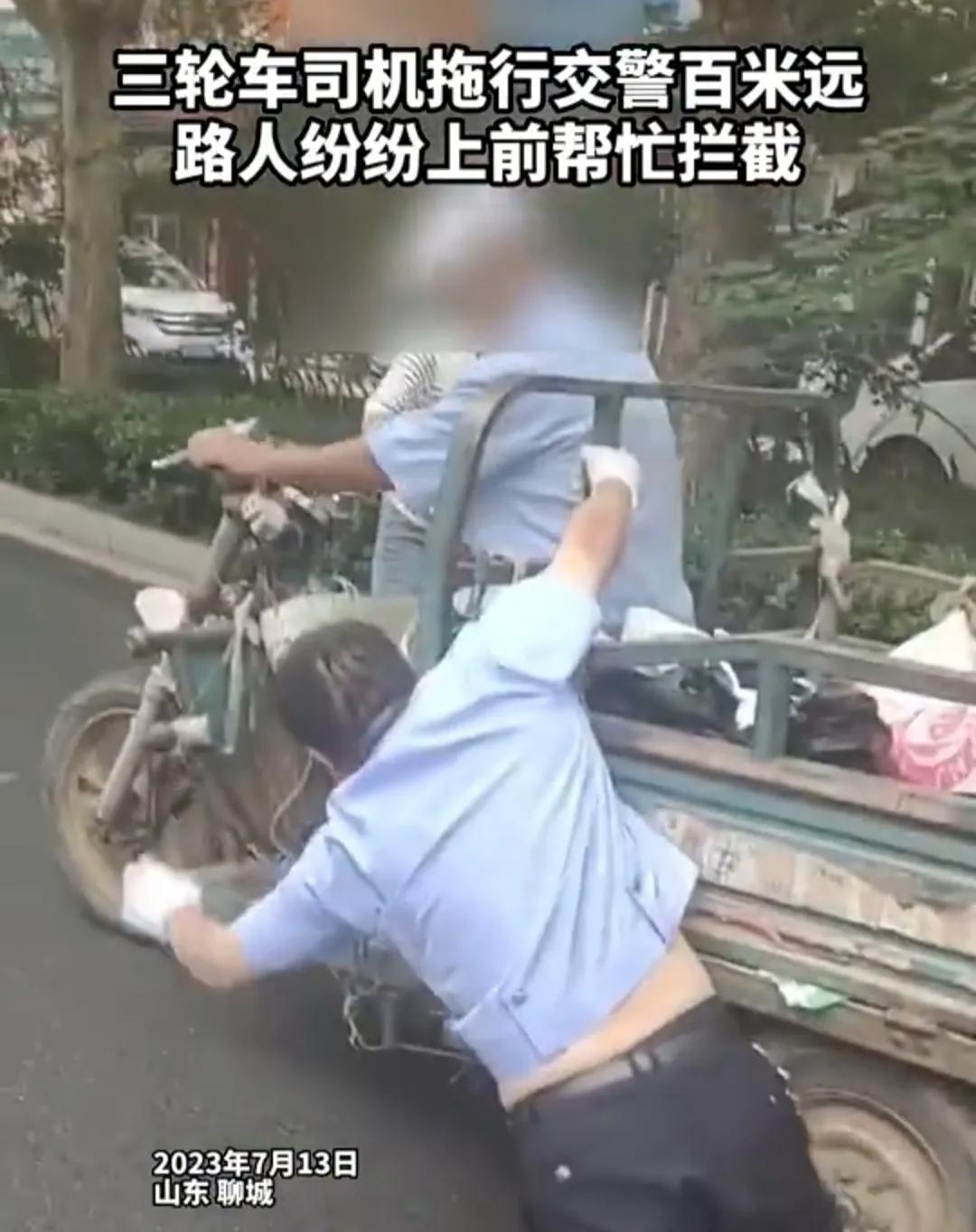 男子骑三轮车拖行交警百米远,男子系听力障碍者,民警予以谅解