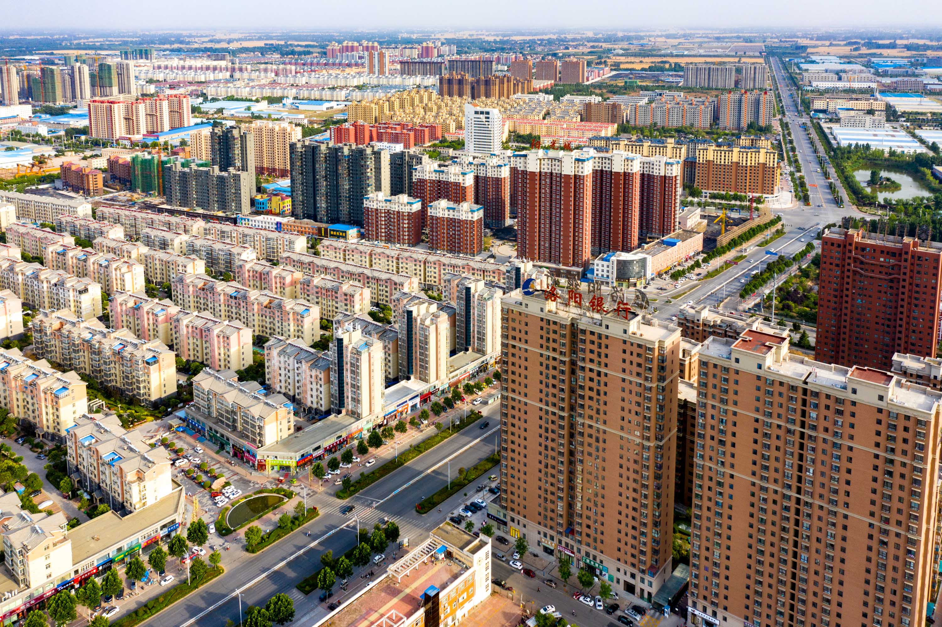 中国城镇化率提高,城乡收入差距问题如何解决?