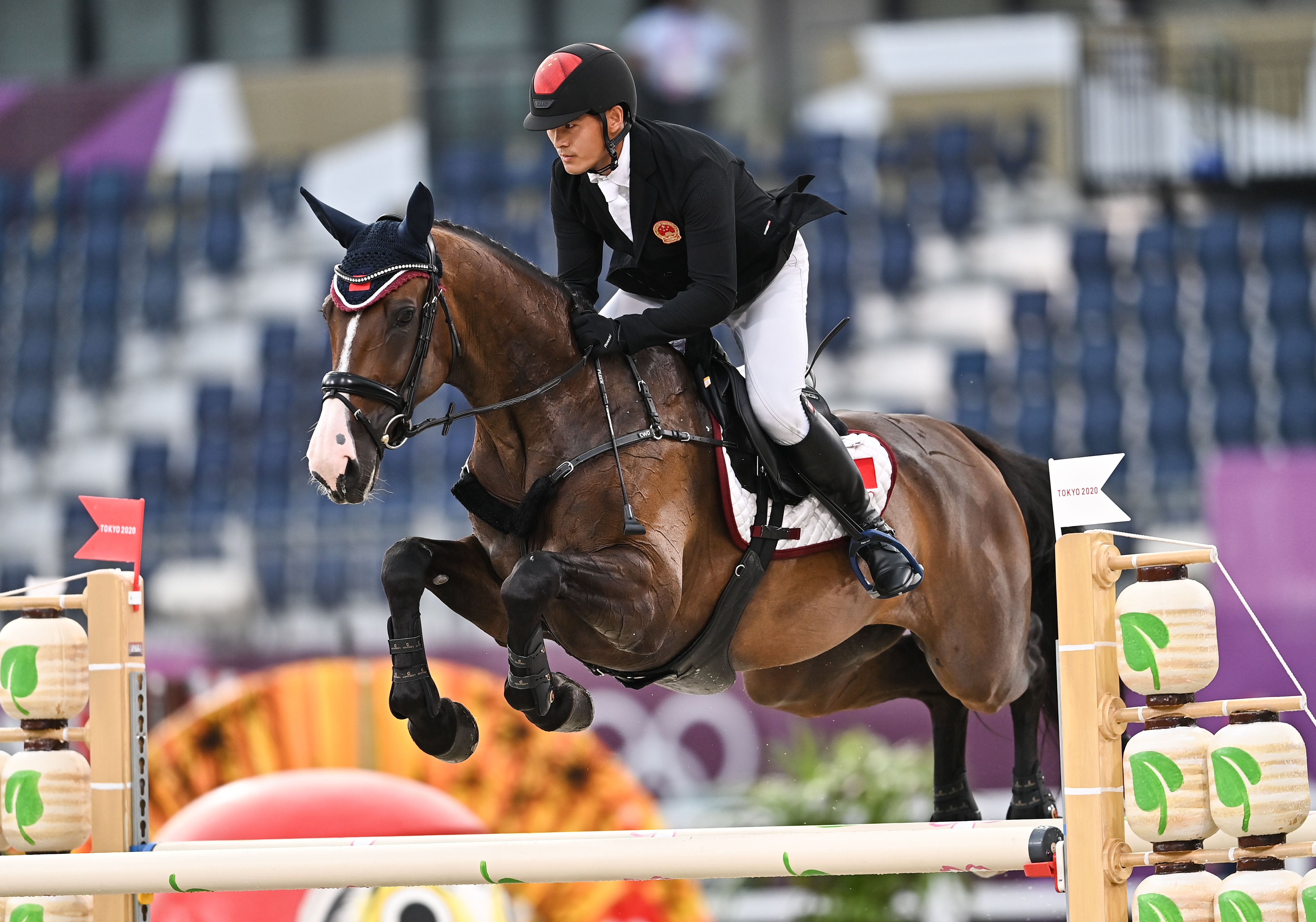 马术——中国队获得马术三项团体第九名