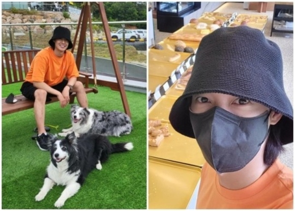 金贤俊近况曝光 在咖啡厅与爱犬们合影留念