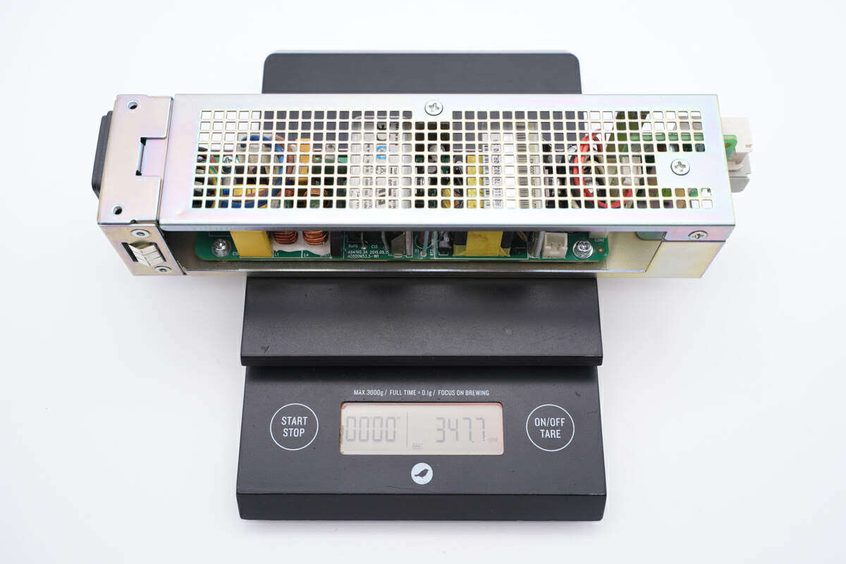 我们把华为optix osn500光传输系统60w电源拆了,比想象的要简单