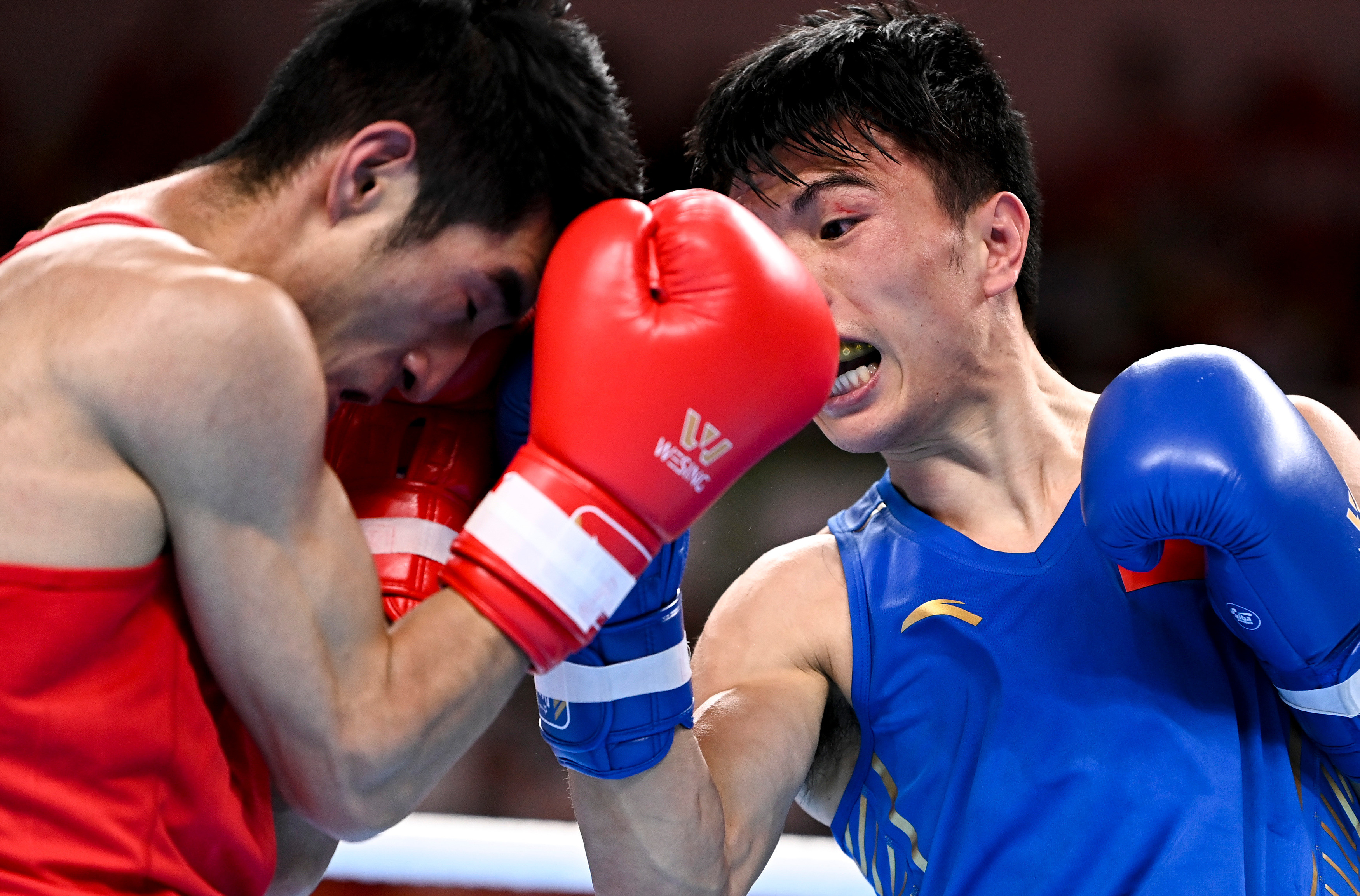 拳击——男子52公斤级:胡建关夺冠