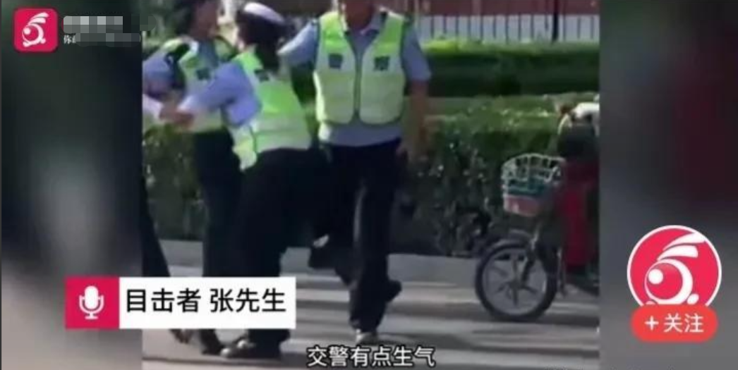 為人民服務5個字前,女交警暴力執法,對電動車女騎手說:弄死你