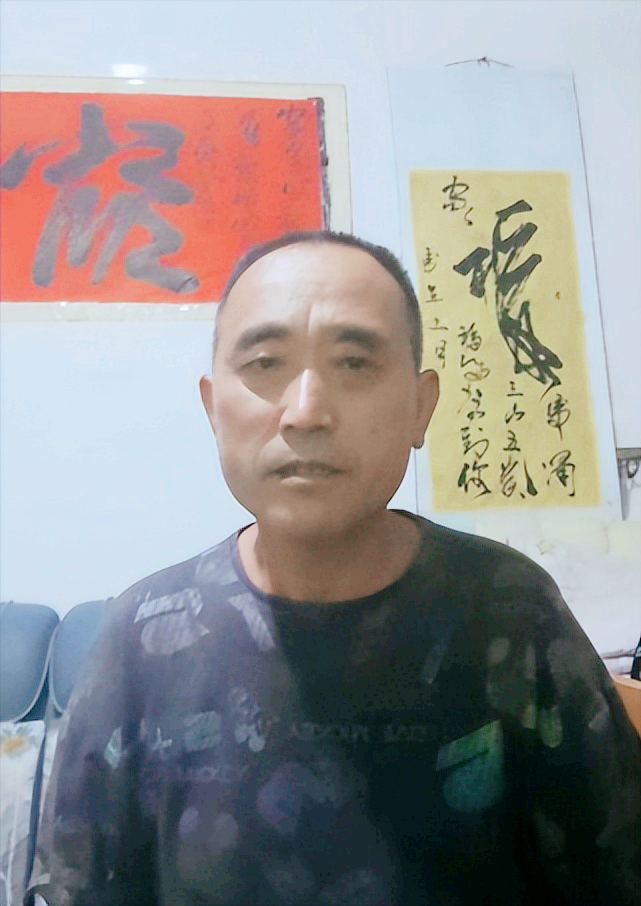 张光银荣获"人民书画家"光荣称号