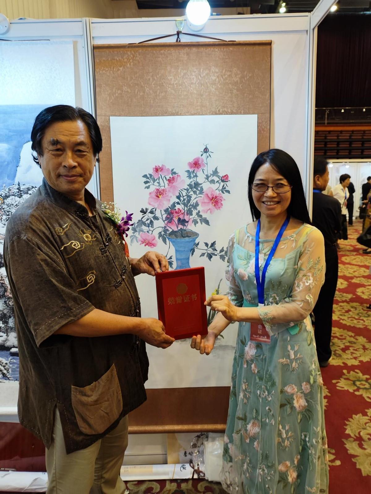 画家秦晓晓与中美协理事王阔海开展艺术交流