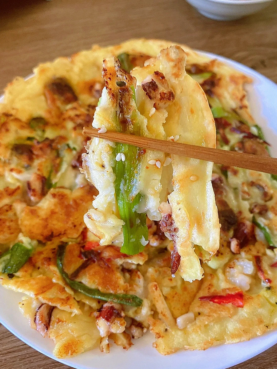 一口封神,延吉海鲜葱饼的做法  亲爱的们,今天我要分享的是一道让人