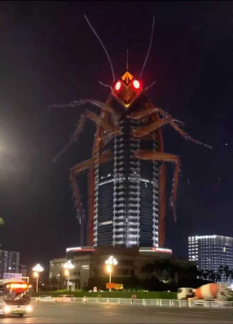 广州出现一巨型蟑螂,广州中银大厦建筑,发光的眼睛其实是中国银行的